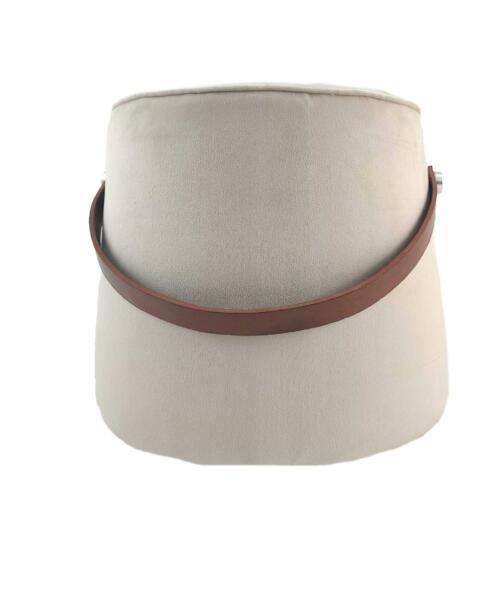 Handmade pouf styled in a quiet desert-inspired setting with minimal accessories