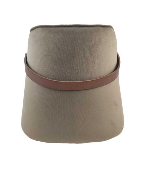 Handmade pouf styled in a quiet desert-inspired setting with minimal accessories