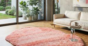fur rugs placed beside bed creating cozy and soft bedroom interior