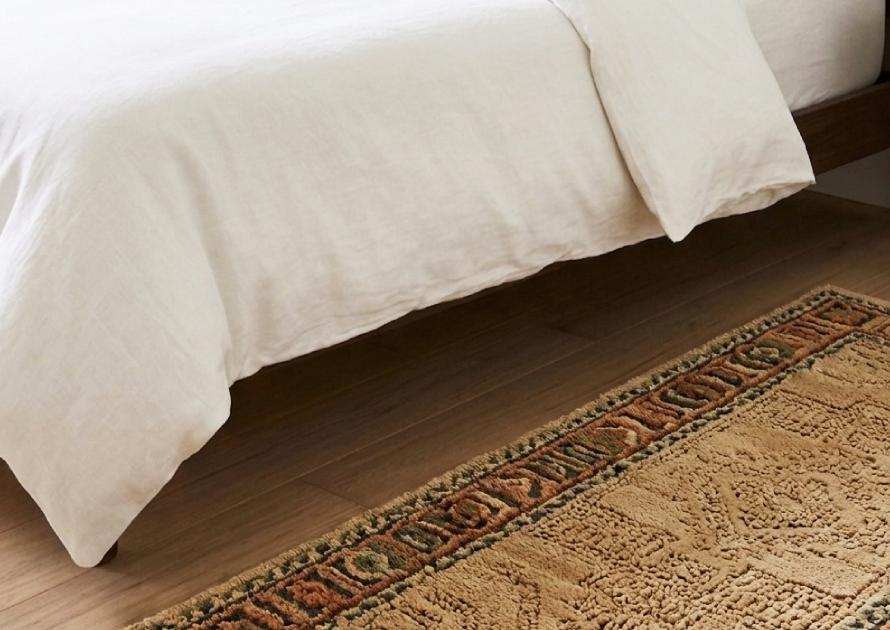bedroom runners placed beside bed in a cozy modern bedroom